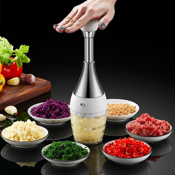 Stainless Steel manual food processor, chops garlic, onions, fruit and vegetables.