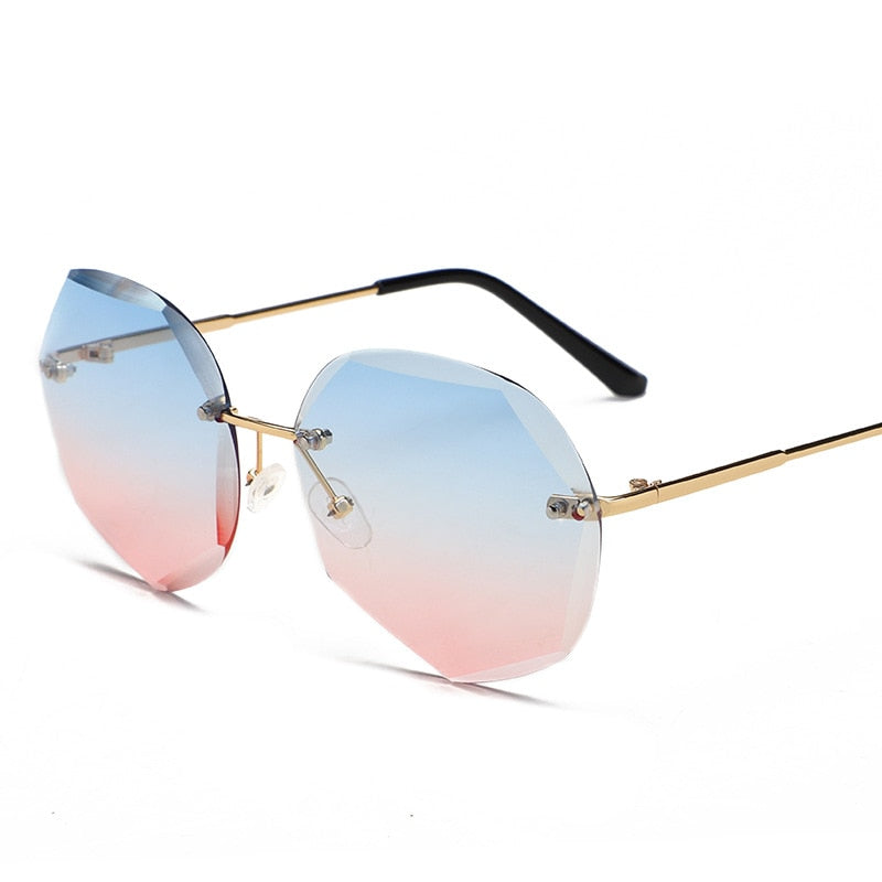 Women's rimless Gradient designer sunglasses.