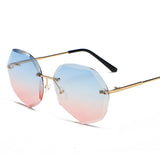 Women's rimless Gradient designer sunglasses.