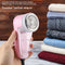 Rechargeable USB fabric shaver removes fuzz and lint from your clothes.