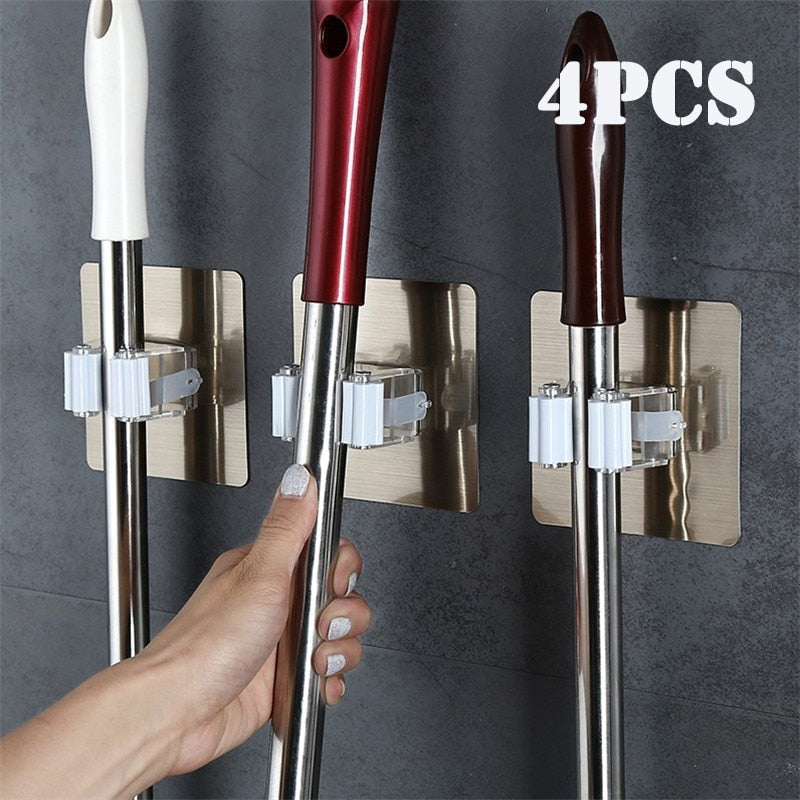 2/4pcs Adhesive wall mounted multi-purpose hooks.  Strong enough to hang brooms and mops.  Great for organizing kitchen utensils.